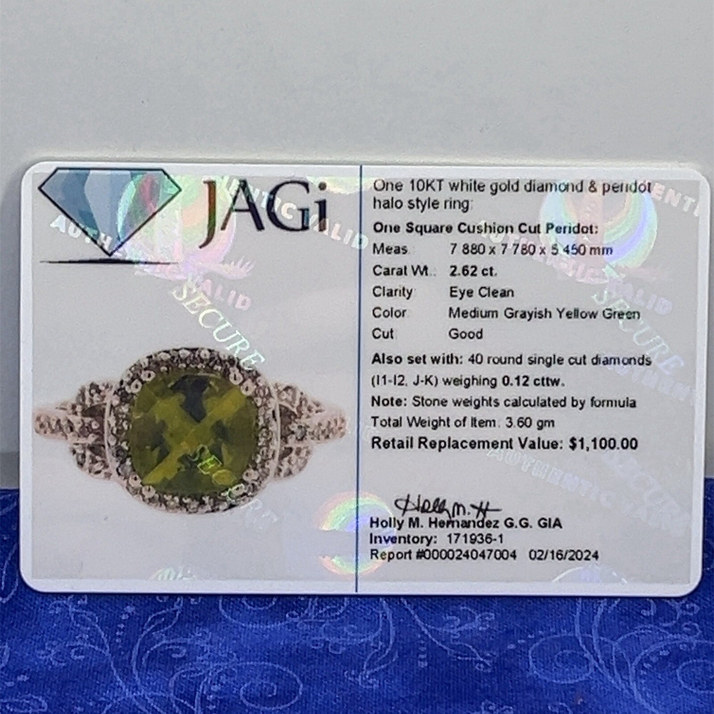 10 karat white gold diamond and peridot halo style ring size 7.54