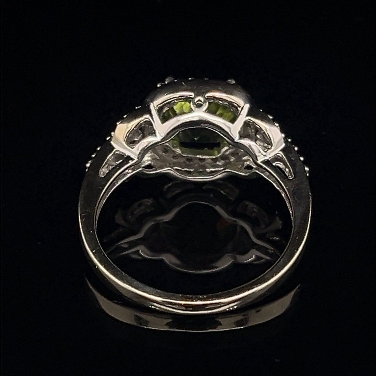 10 karat white gold diamond and peridot halo style ring size 7.53