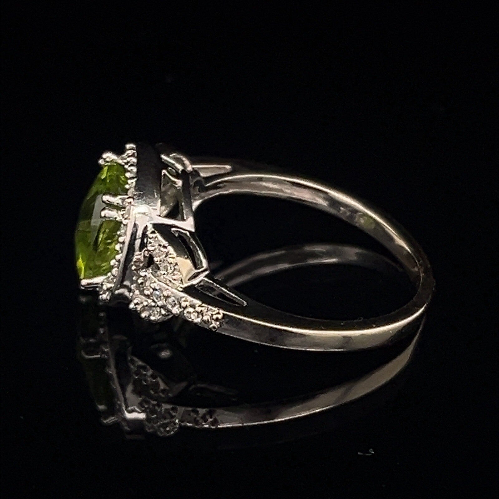 10 karat white gold diamond and peridot halo style ring size 7.52