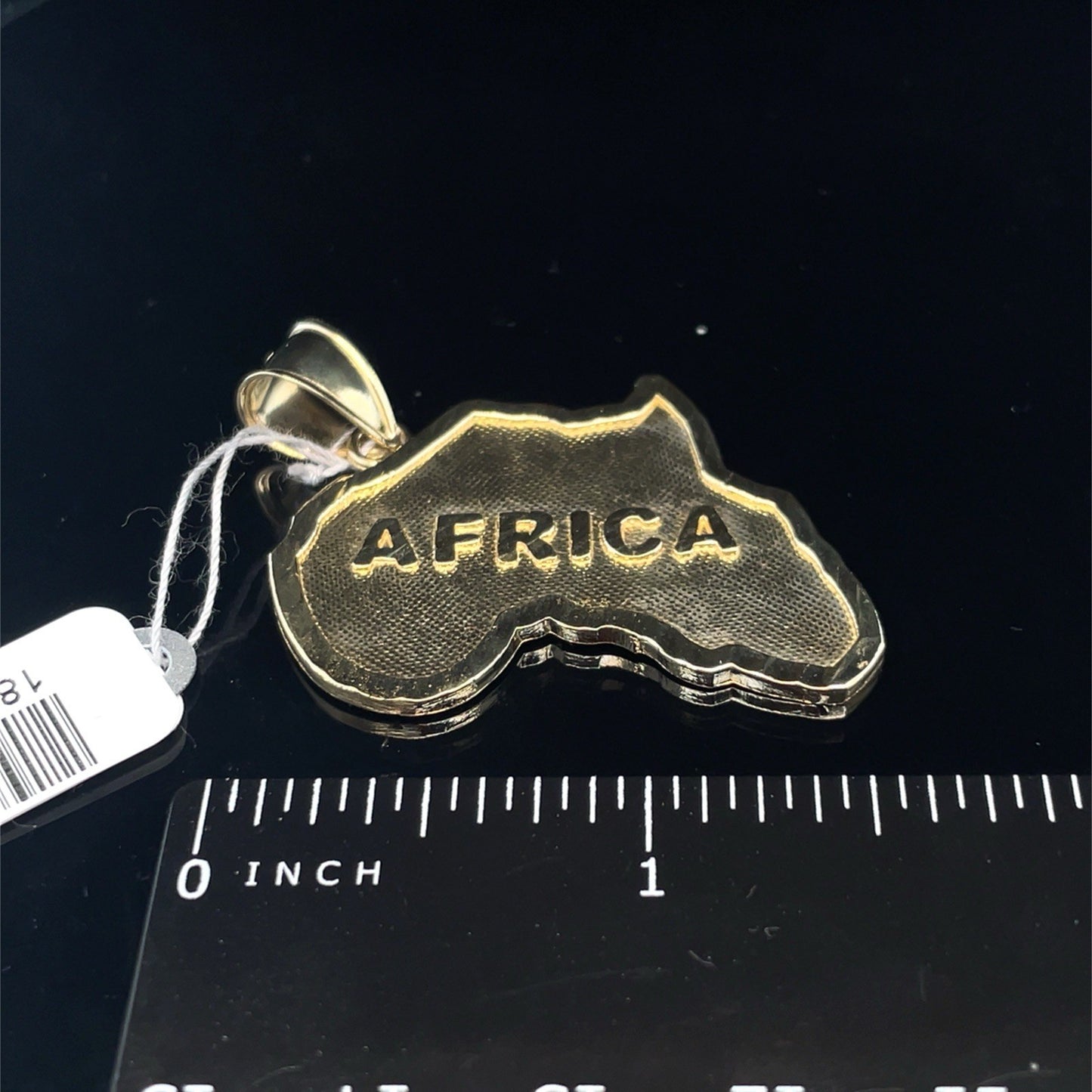 10k Yellow Gold Africa Pendant 5.60g3