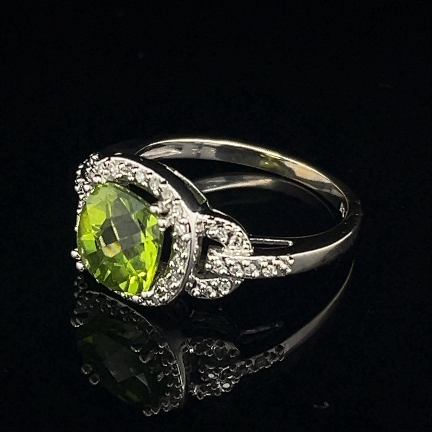 10 karat white gold diamond and peridot halo style ring size 7.51