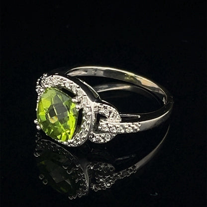10 karat white gold diamond and peridot halo style ring size 7.51