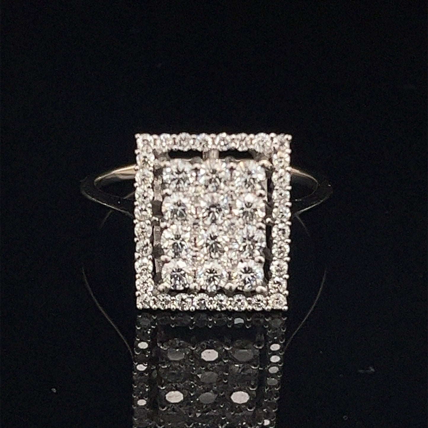 14 karat white gold rectangle diamond cluster ringG-H SI  .77 CTW size 71
