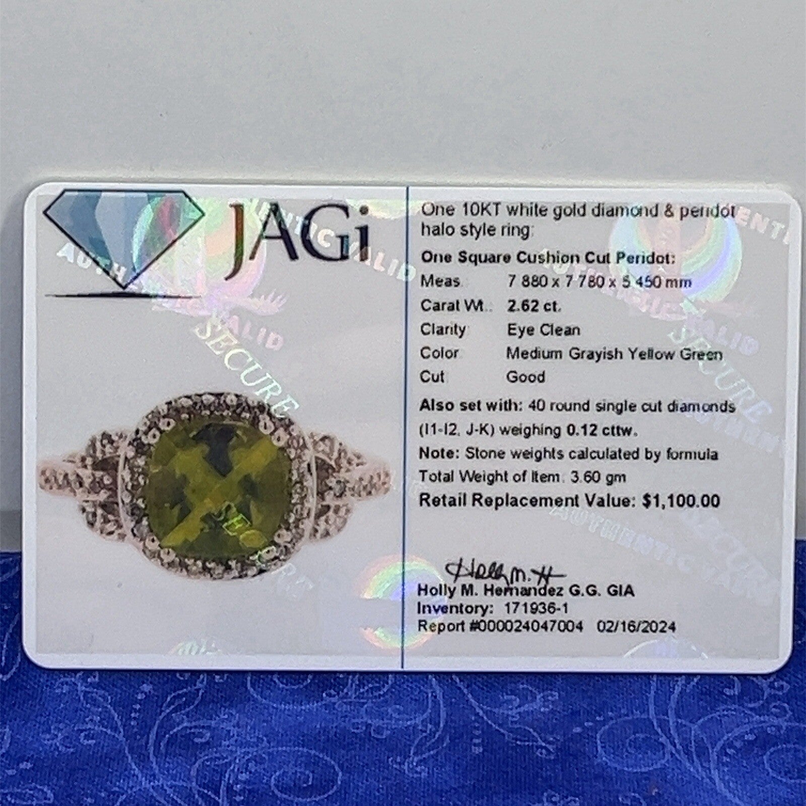 10 karat white gold diamond and peridot halo style ring size 7.54