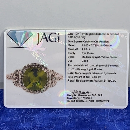 10 karat white gold diamond and peridot halo style ring size 7.54