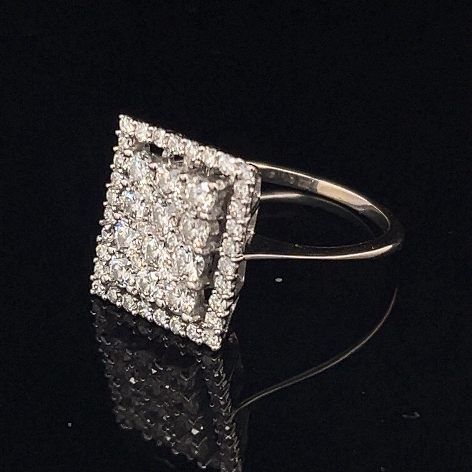 14 karat white gold rectangle diamond cluster ringG-H SI  .77 CTW size 70