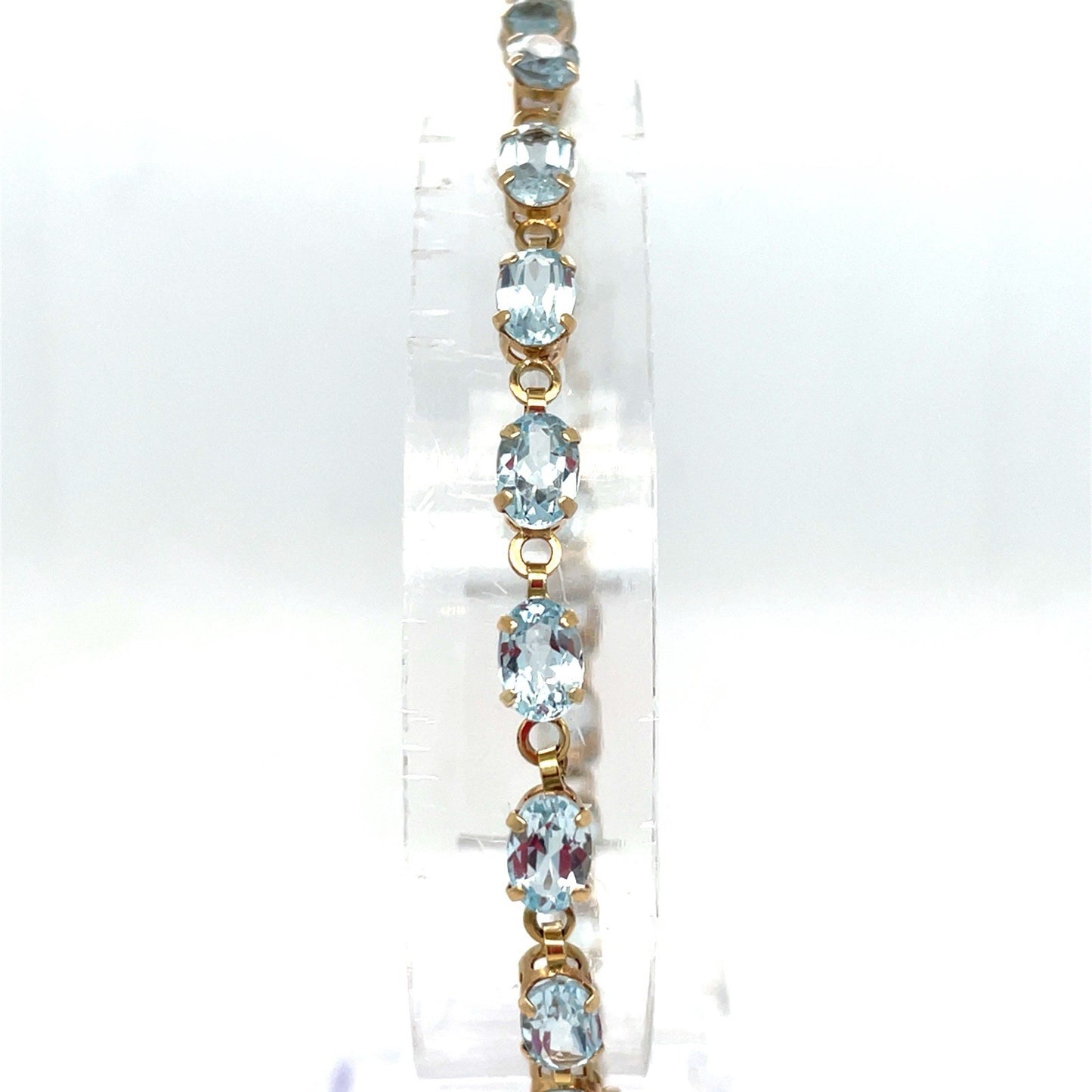 10k Yellow Gold Women’s 8” Oval Blue Topaz Bracelet 5.50g1