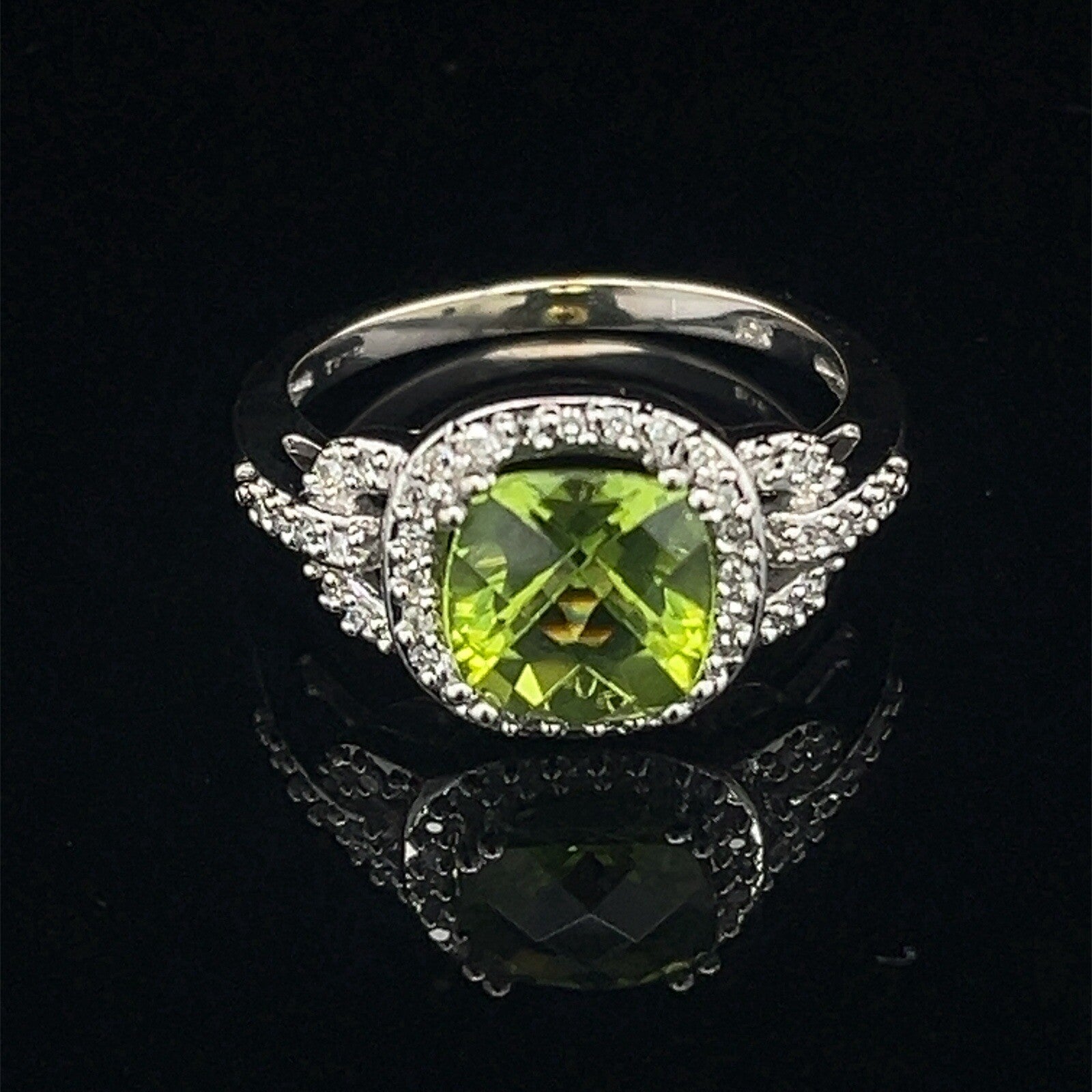 10 karat white gold diamond and peridot halo style ring size 7.50