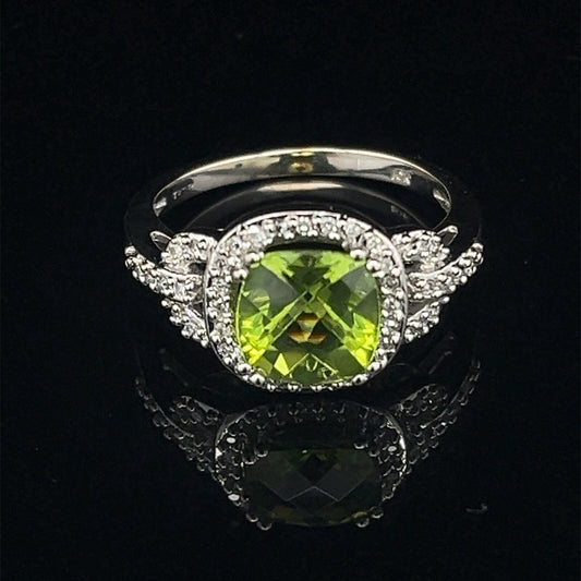 10 karat white gold diamond and peridot halo style ring size 7.50