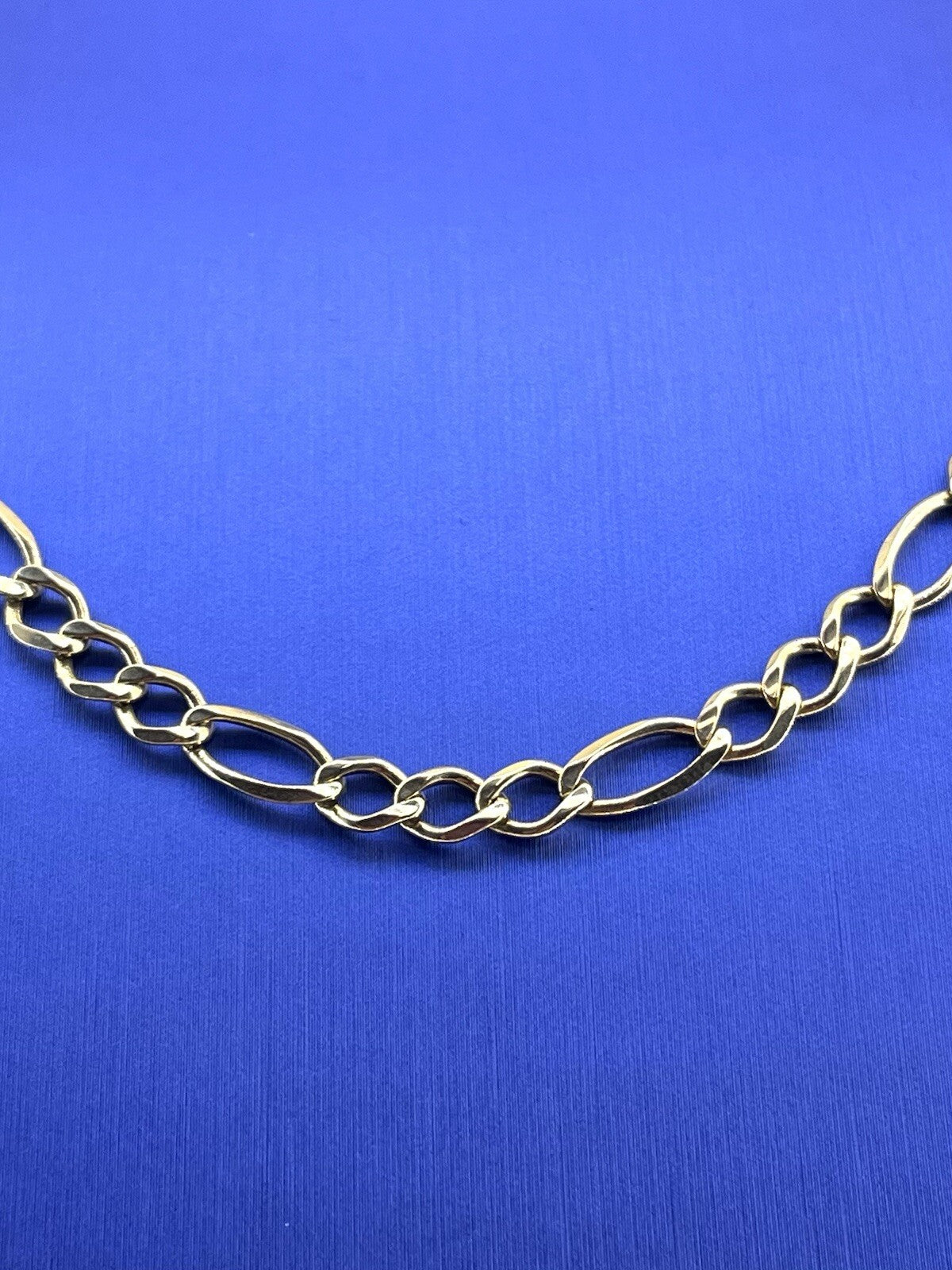 24” 10k yellow gold hollow Figaro 5.5mm 18.6g1