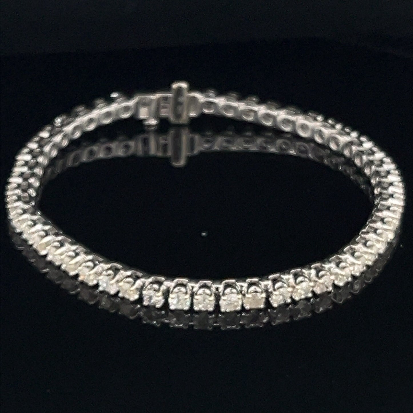 14 Karat white gold tennis bracelet 4.75 CTW round brilliant diamonds0