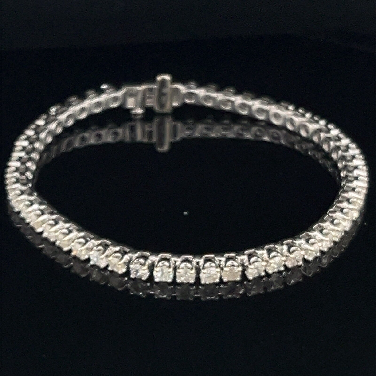 14 Karat white gold tennis bracelet 4.75 CTW round brilliant diamonds0